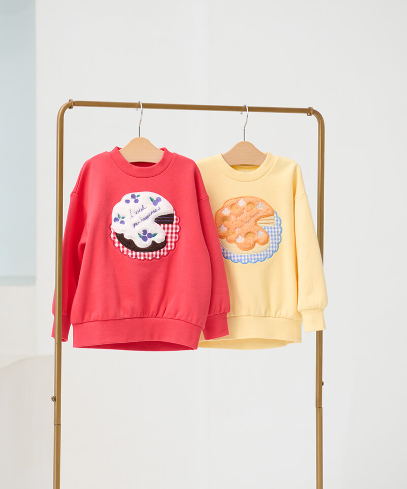 n.o.u.s ハッピーケーキトレーナー